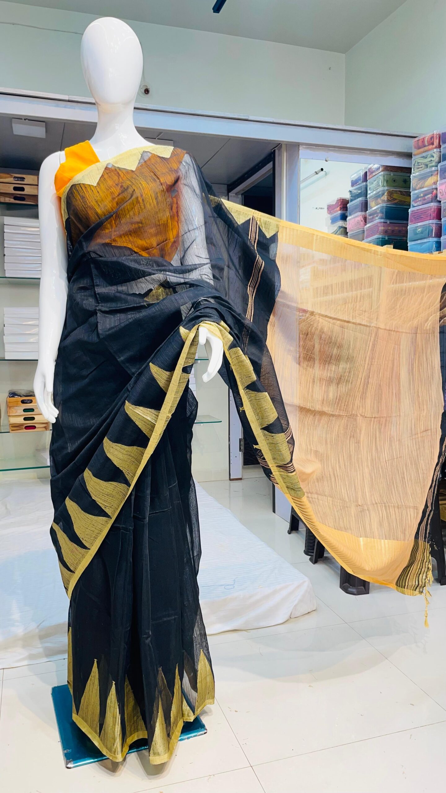 Pure handloom cotton saree with temple border – Black body and Golden border.